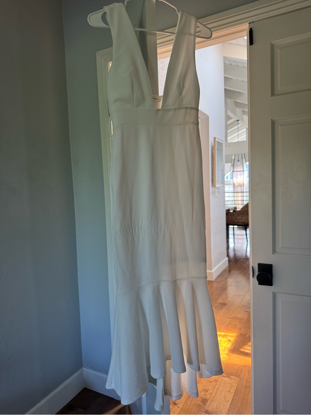 White Sleeveless V-Neck Flounced Hem Dress